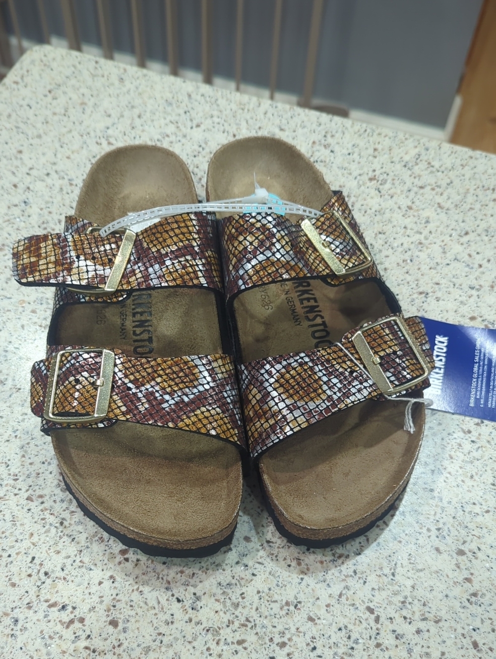 Birkenstock Arizona Snake-Print Double Buckle Sandals in Brown and Gold 37